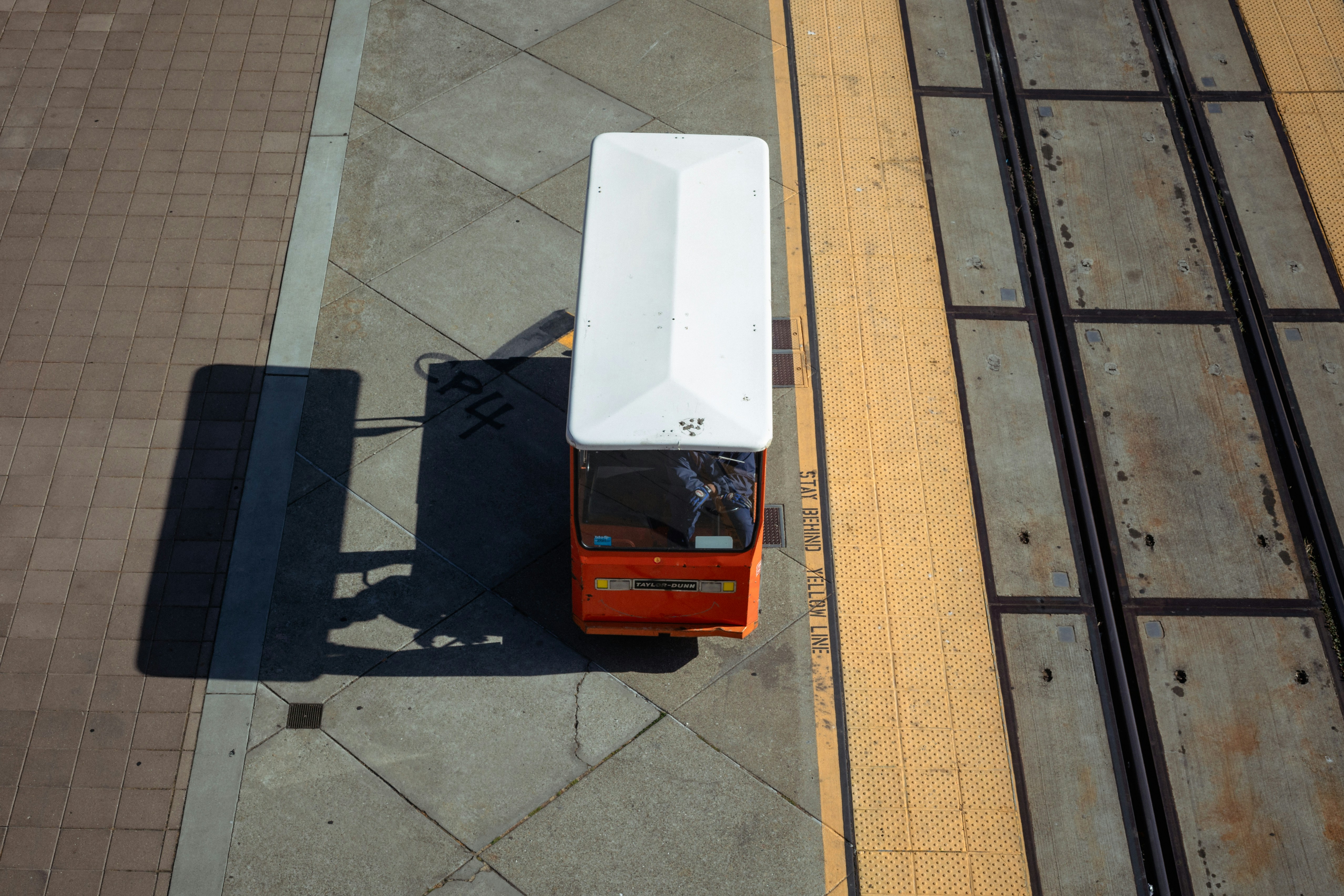 A white table sitting on top of a train track