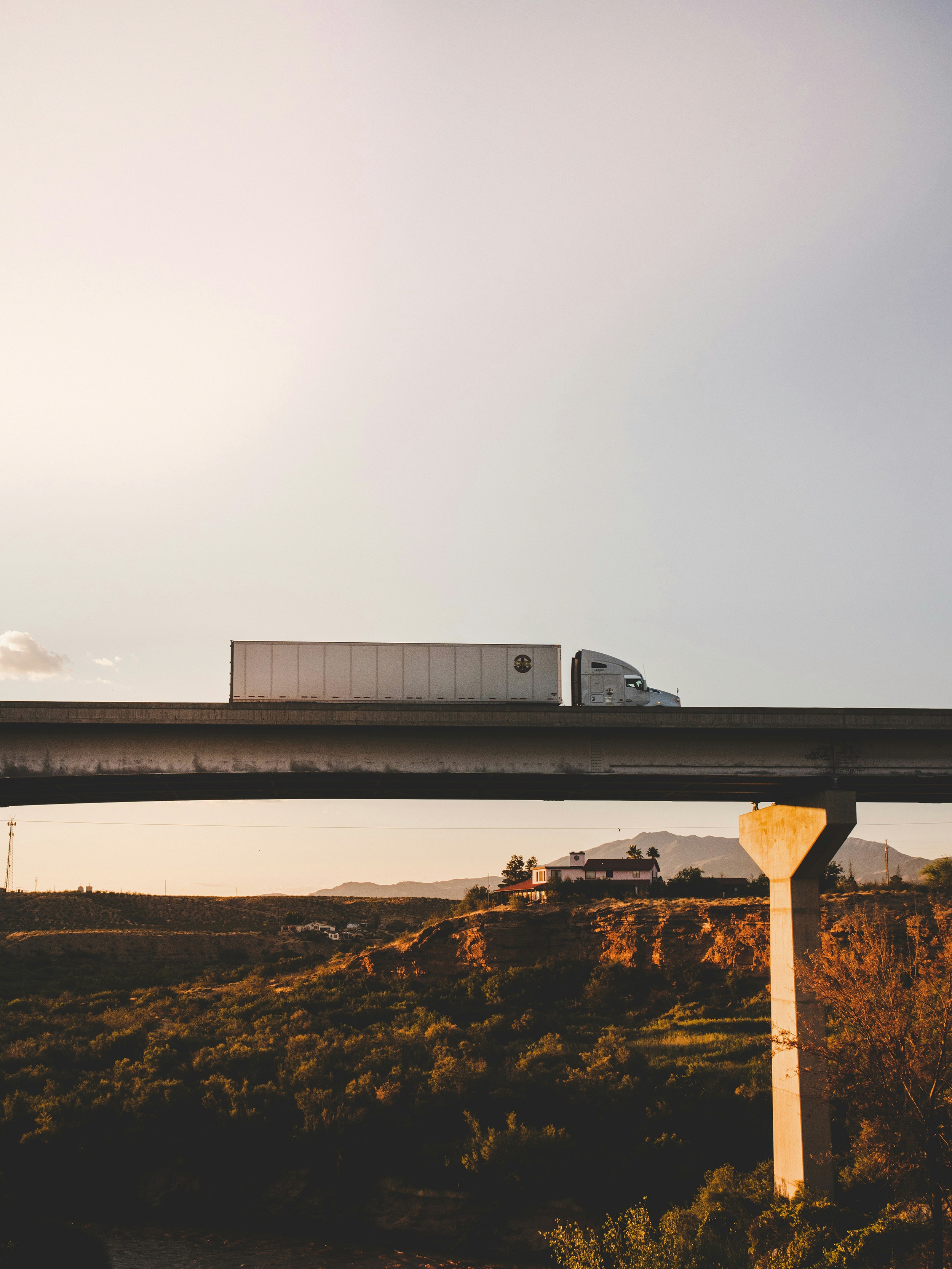 black truck on road during daytime